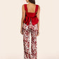 Pantalones Mercedes Blancos con Amibas Rojas